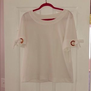 Ivanka Trump white shit with rose gold detail